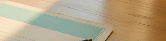 Blank teal appointment card on a warm wood therapy-office desk in soft window light for Better Access ops work